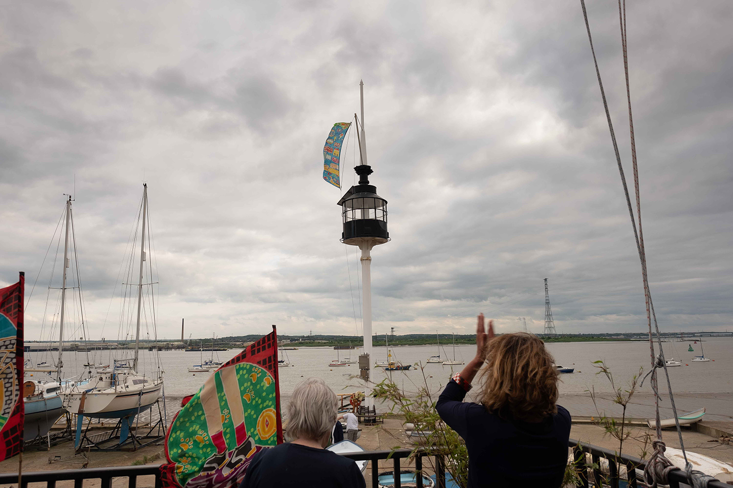 A festival flag is raised on the flag pole at Thurrock Yacht Club