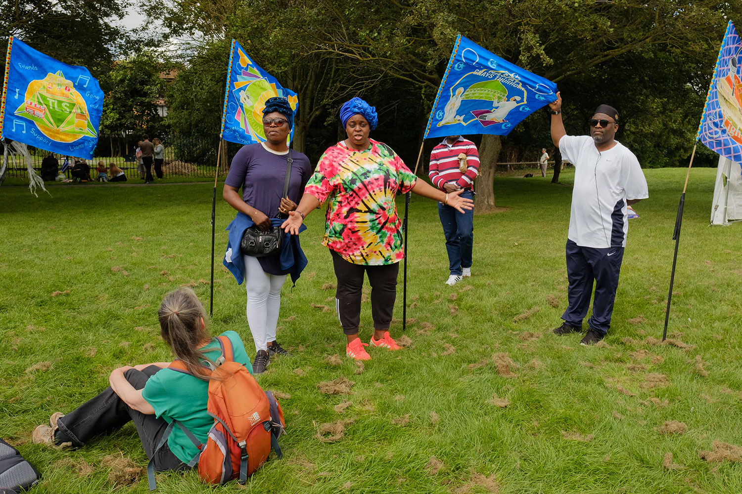 Bola and Remi speak about their group represented on one of the new Grays flags