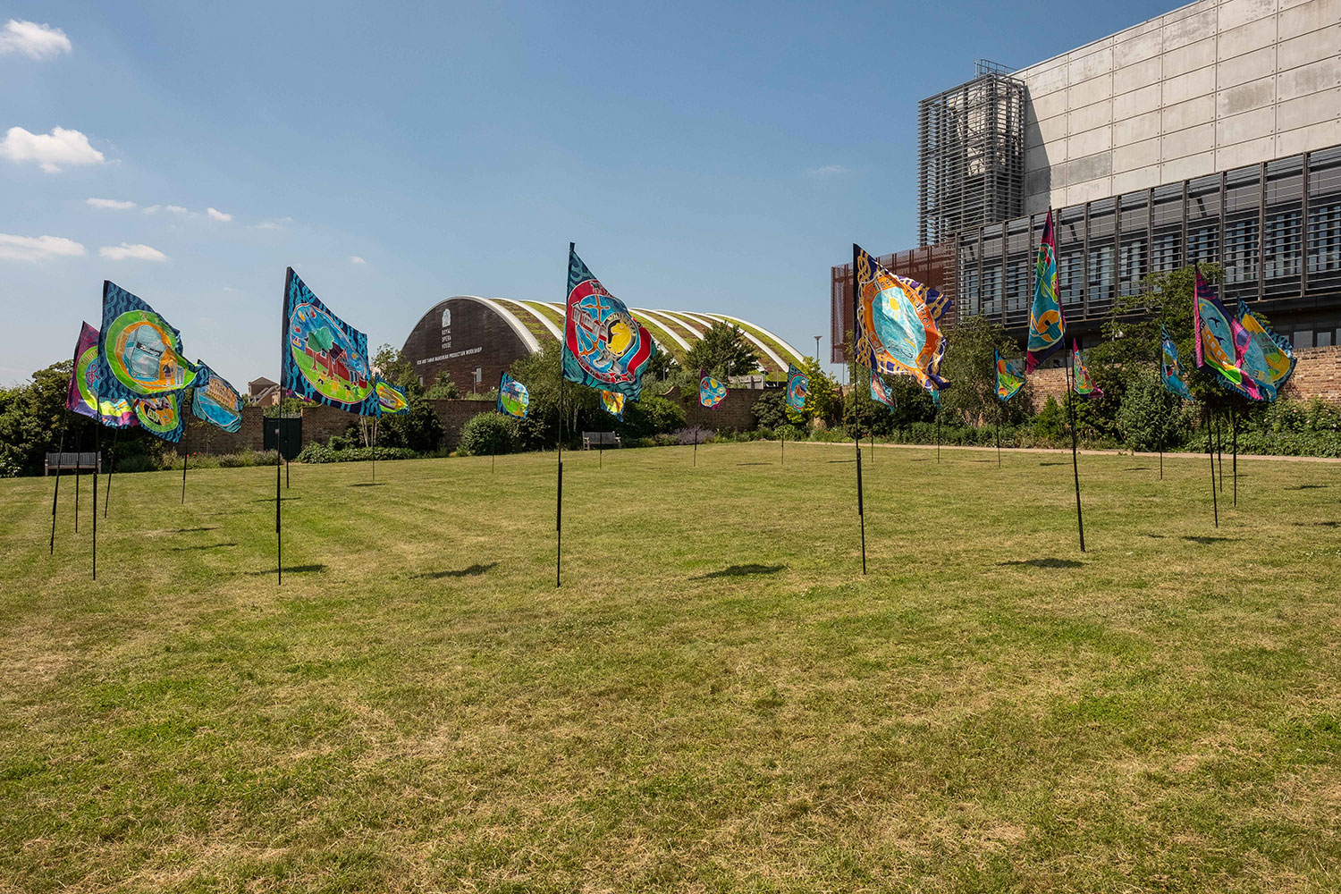 Flags decorate the grounds of High House Production Park
