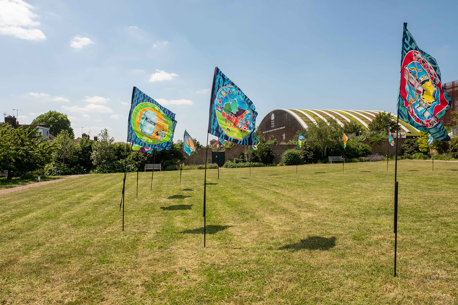 Flags decorate the grounds of High House Production Park